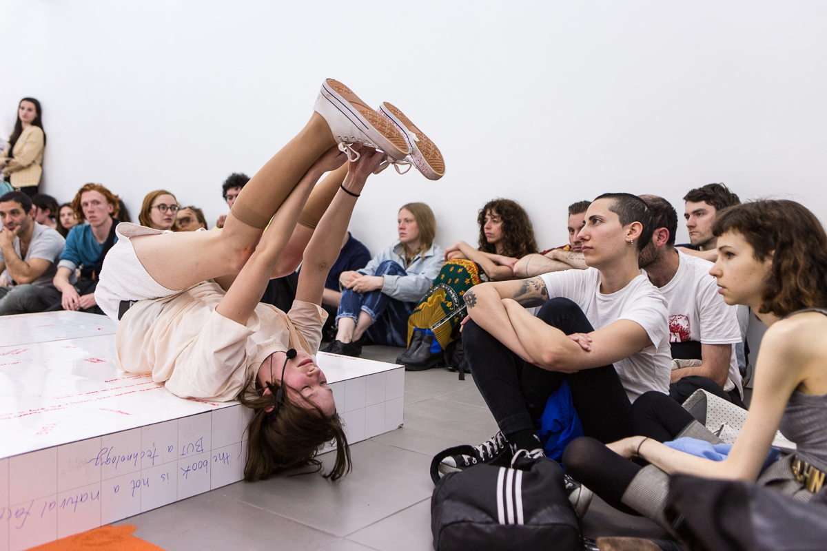 DOROTA GAWĘDA & EGLĖ KULBOKAITĖ, YGRG 14X: readibg with a single hand V , 2018.  Performance at Cell Project Space, London.