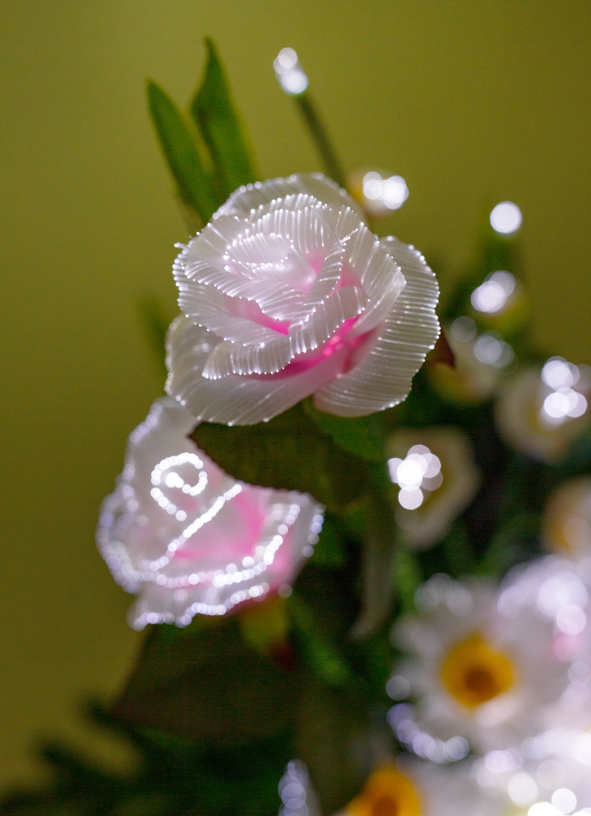 Freestanding Votive Flowers (I–VII), 2022

Optical fibres, paper and plastic flowers, programmed LED light grid, mirror polished stainless steel.



