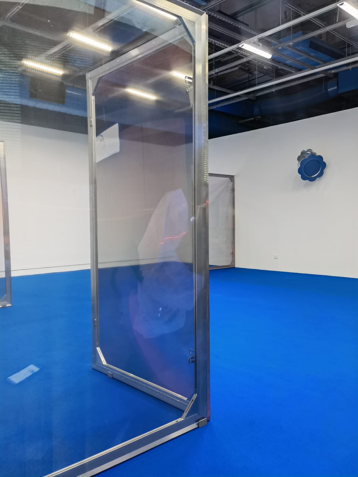 Leave No Trace (Athens) I-VIII 2022. Stainless steel, wood, digital print on chiffon; 110 cm x 200 cm each

Yield, 2021. Mirror polished aluminium cast; 51 x 70 x 41 cm.