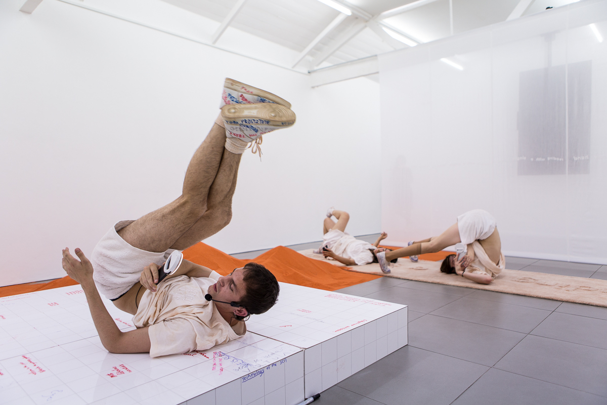 DOROTA GAWĘDA & EGLĖ KULBOKAITĖ, YGRG 14X: readibg with a single hand V , 2018.  Performance at Cell Project Space, London.