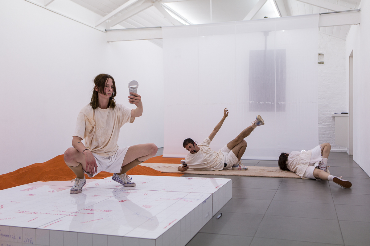DOROTA GAWĘDA & EGLĖ KULBOKAITĖ, YGRG 14X: readibg with a single hand V , 2018.  Performance at Cell Project Space, London.