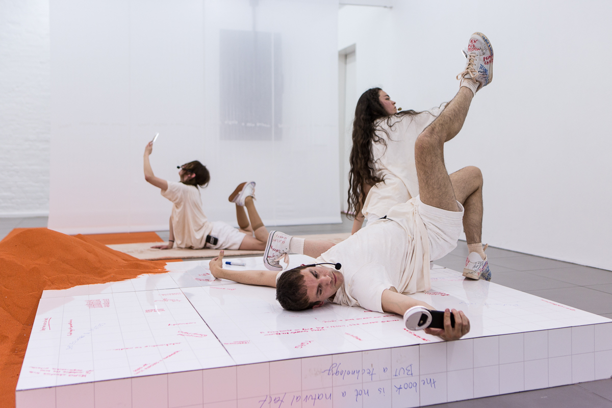 DOROTA GAWĘDA & EGLĖ KULBOKAITĖ, YGRG 14X: readibg with a single hand V , 2018.  Performance at Cell Project Space, London.