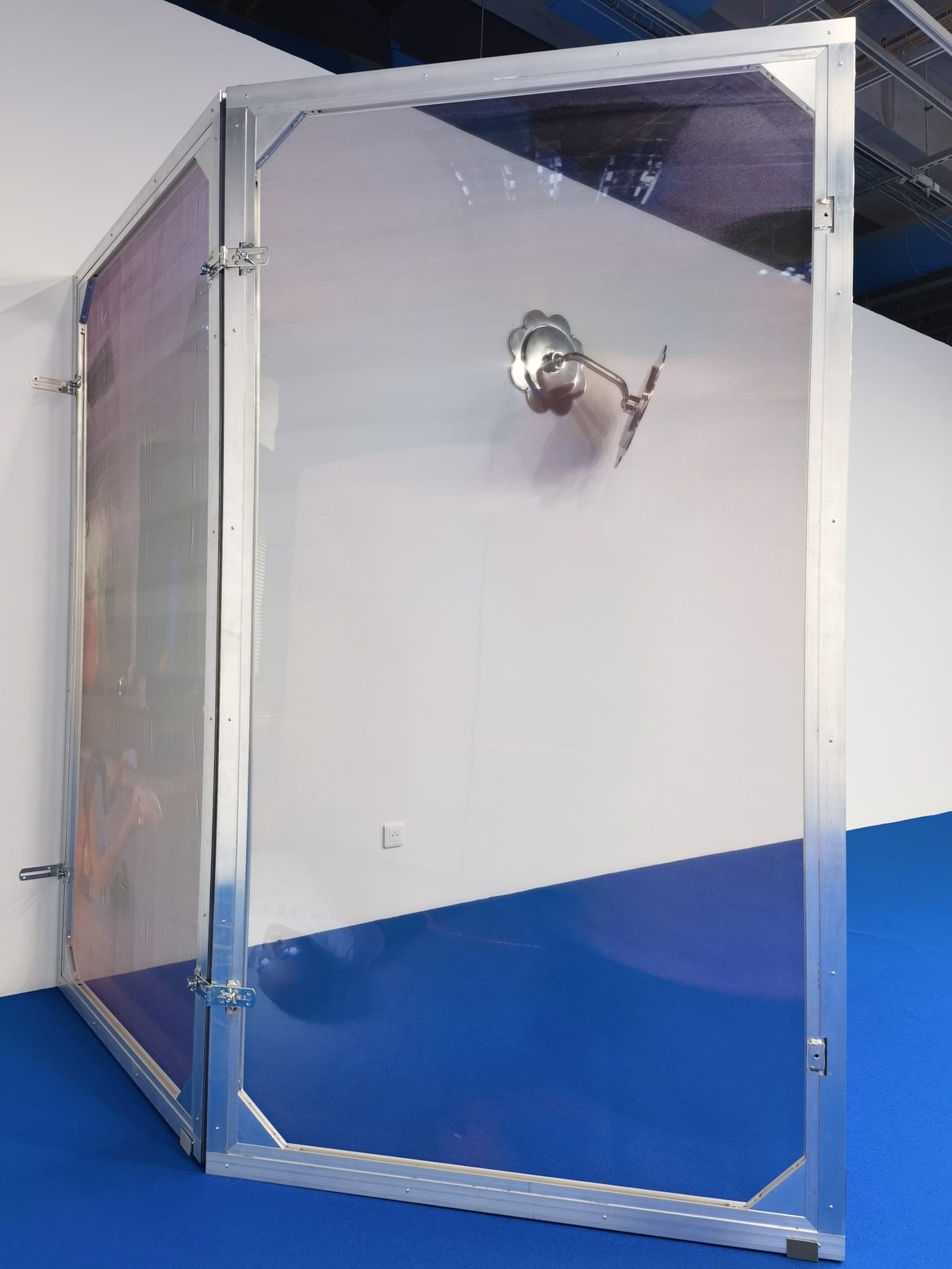 Leave No Trace (Athens) I-VIII 2022. Stainless steel, wood, digital print on chiffon; 110 cm x 200 cm each

Yield, 2021. Mirror polished aluminium cast; 51 x 70 x 41 cm.