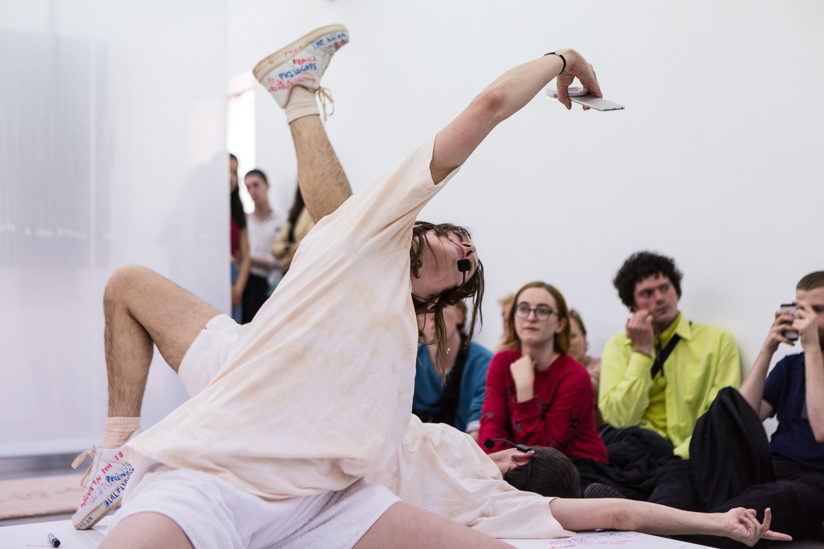 DOROTA GAWĘDA & EGLĖ KULBOKAITĖ, YGRG 14X: readibg with a single hand V , 2018.  Performance at Cell Project Space, London.