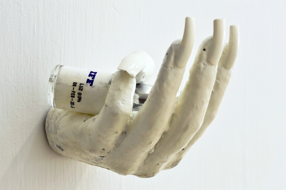 Dorota Gawęda and Eglė Kulbokaitė, Can Ai feel a tansient gentle sadness?, 2016; CONCRETE, FAKE NAILS, NAIL JEWELRY, ACRYLIC PAINT, IFF BOTTLE [PRODUCED IN COLLABORATION WITH CLEMENCE DE LA TOUR DU PIN AND INTERNATIONAL FLAVOURS AND FRAGRANCES INC. NEW YORK] (13 x 7 x 7 cm)