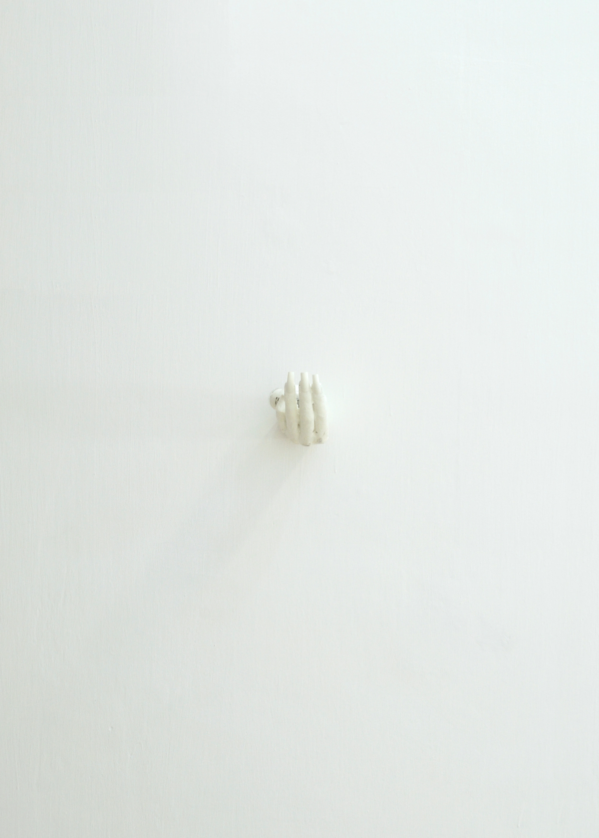 Dorota Gawęda and Eglė Kulbokaitė, Can Ai feel a tansient gentle sadness?, 2016; CONCRETE, FAKE NAILS, NAIL JEWELRY, ACRYLIC PAINT, IFF BOTTLE [PRODUCED IN COLLABORATION WITH CLEMENCE DE LA TOUR DU PIN AND INTERNATIONAL FLAVOURS AND FRAGRANCES INC. NEW YORK] (13 x 7 x 7 cm)