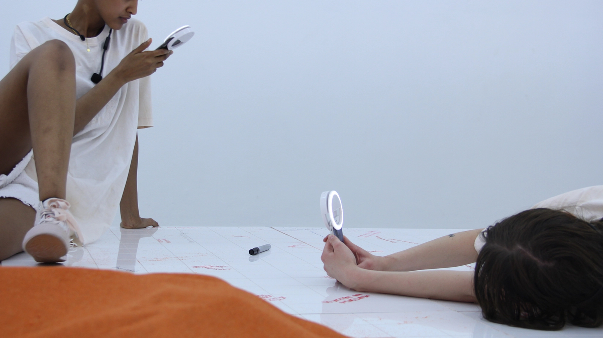 DOROTA GAWĘDA & EGLĖ KULBOKAITĖ, YGRG 14X: readibg with a single hand V , 2018.  Performance at Cell Project Space, London.