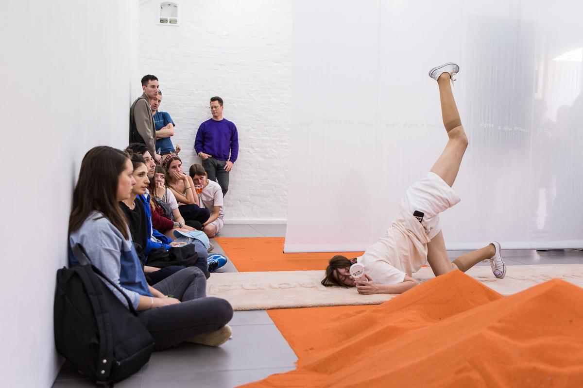 DOROTA GAWĘDA & EGLĖ KULBOKAITĖ, YGRG 14X: readibg with a single hand V , 2018.  Performance at Cell Project Space, London.