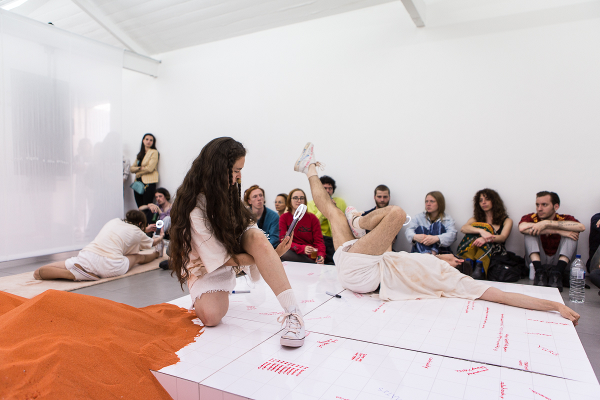 DOROTA GAWĘDA & EGLĖ KULBOKAITĖ, YGRG 14X: readibg with a single hand V , 2018.  Performance at Cell Project Space, London.