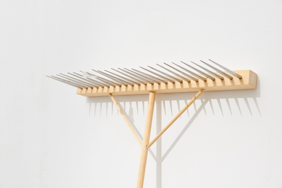 For when I look at you for a moment, then it is no longer possible for me to speak; my tongue has snapped, at once a subtle fire has stolen beneath my flesh, I see nothing with my eyes, my ears hum, sweat pours from me, a trembling seizes me all over, I am greener than grass, and it seems to me that I am a little short of dying. (I–II), 2019 Spruce wood, polished steel, deformed lab glass