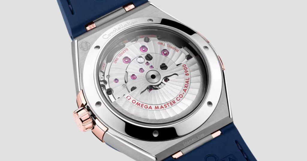 Quartz watch movement showing battery-powered mechanism and crystal oscillator