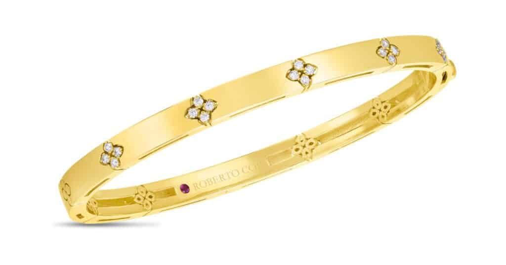 Roberto Coin diamond bangle in 18K gold with satin finish showcasing Italian craftsmanship