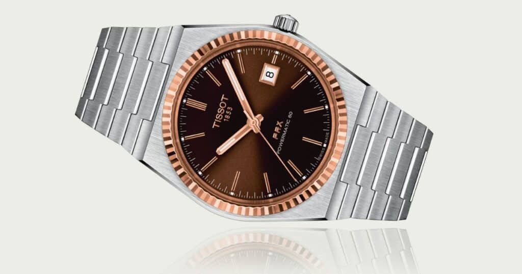 Tissot PRX Powermatic 80 steel watch with 18K rose gold bezel luxury timepiece