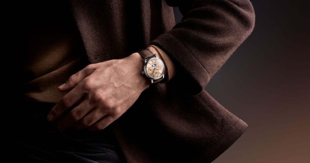Frederique Constant watch with brown alligator leather strap and salmon dial