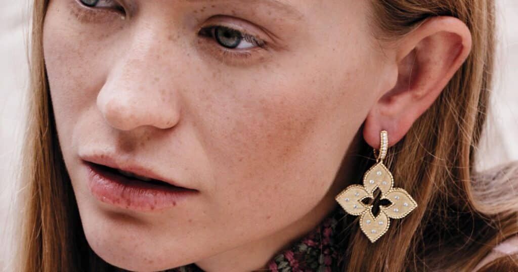 Roberto Coin Venetian Princess gold earrings with rubies and floral design