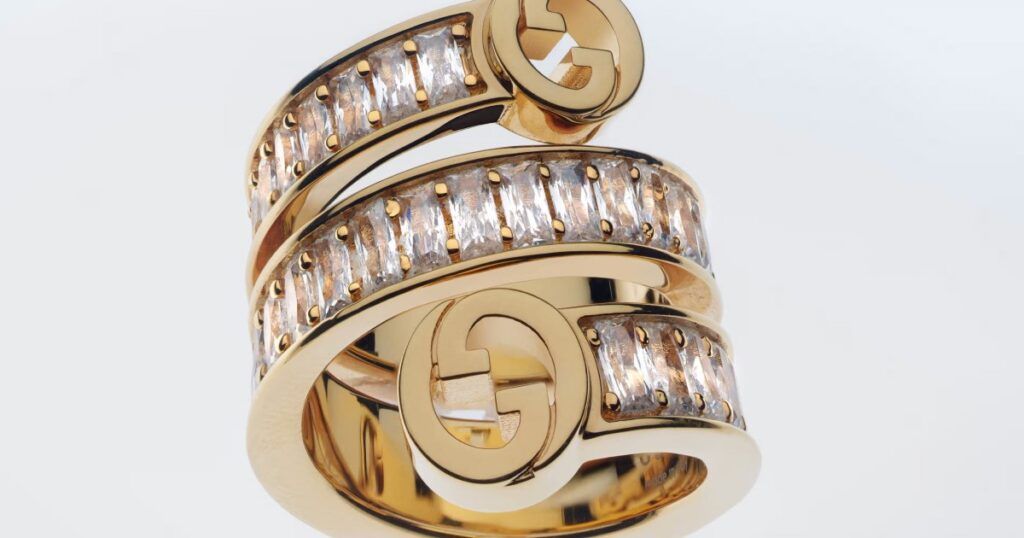 Gucci fashion jewelry collection featuring silver and fine pieces with 10% off savings