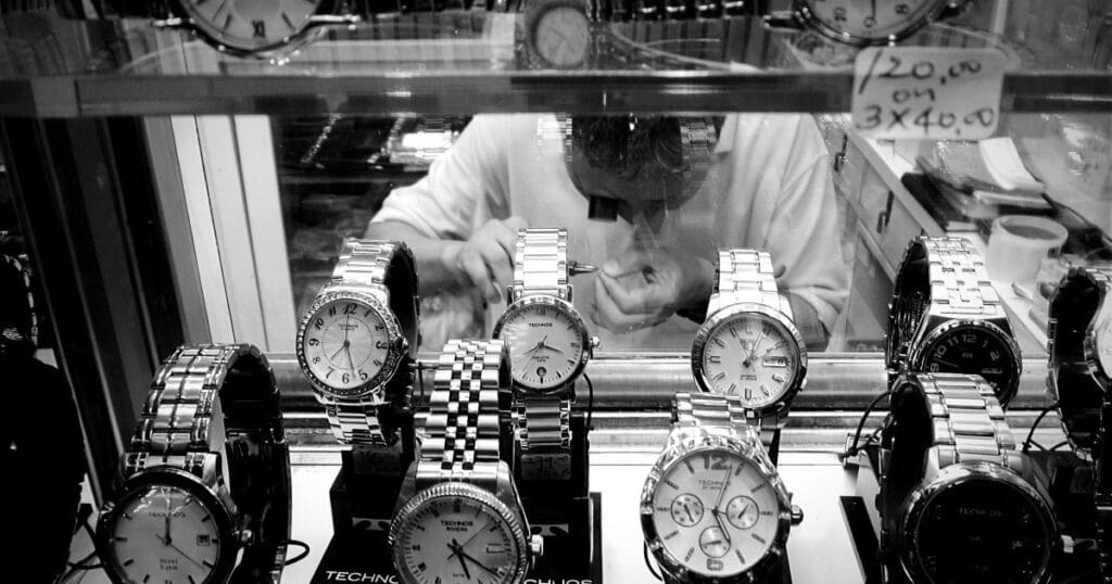 Luxury watch movement being carefully serviced by certified watchmaker for quality repair