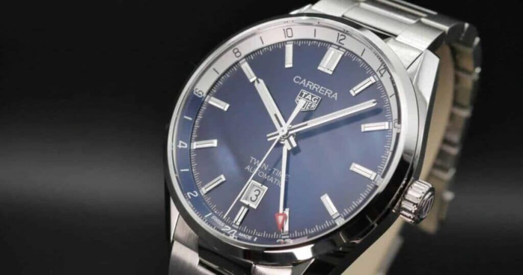 TAG Heuer Carrera Twin-Time GMT watch with red hand and dual timezone display