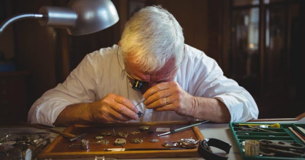 Luxury watch displaying warning signs that indicate need for professional servicing and repair