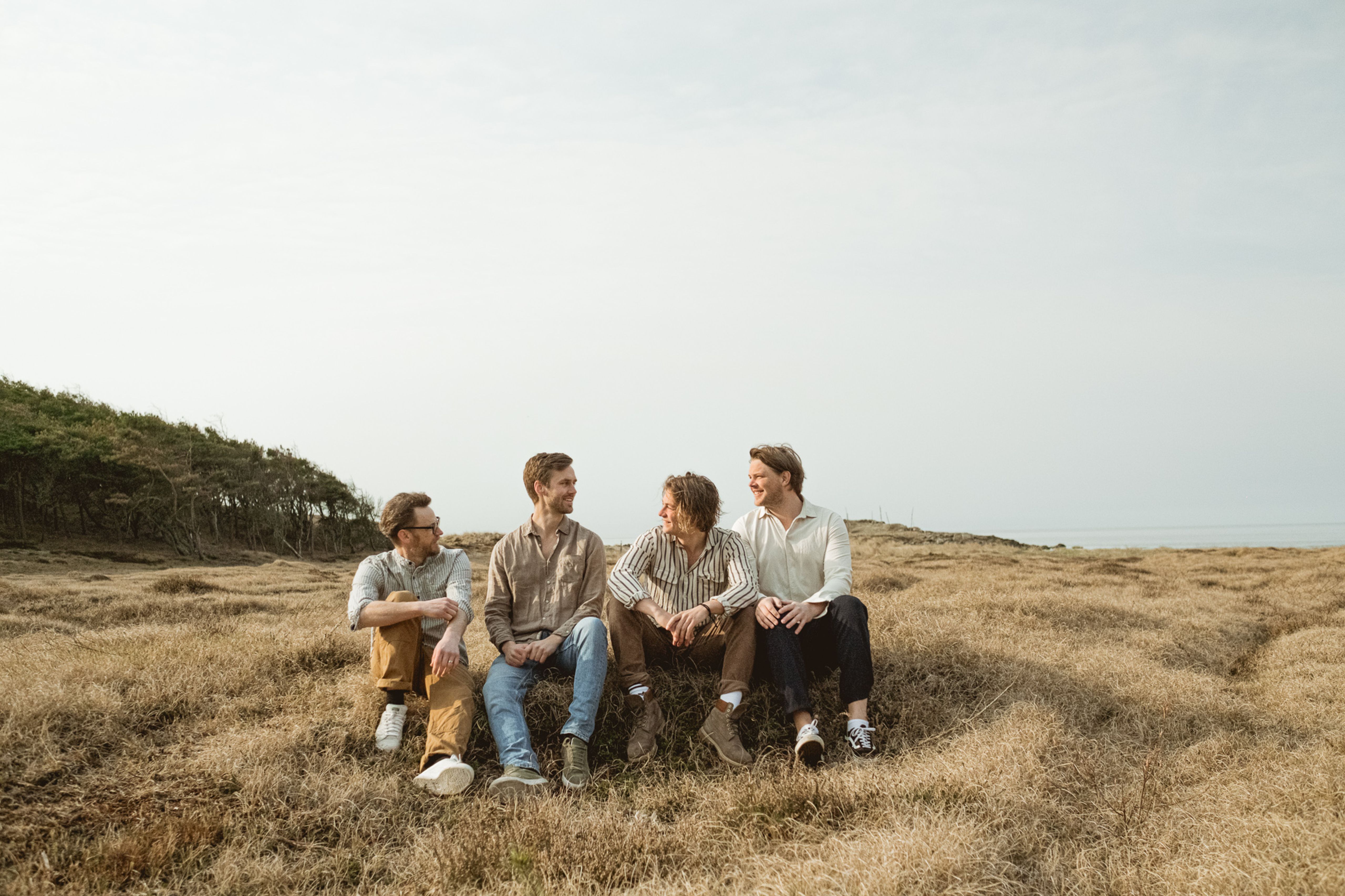 Founders of Skrea Backe Destilleri on a field