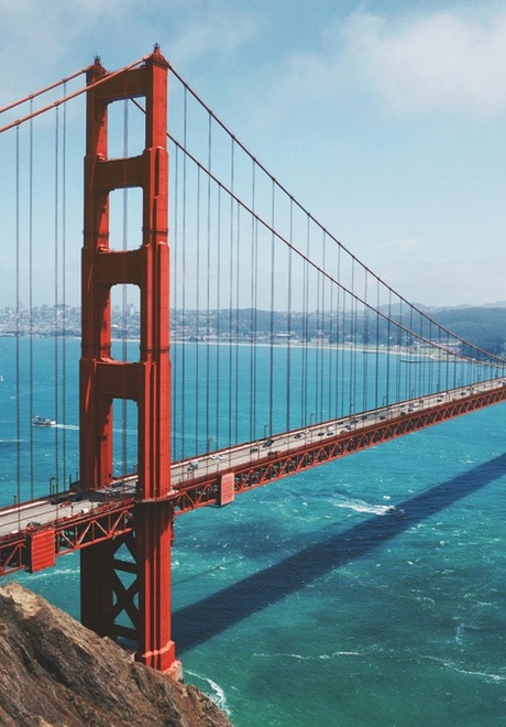 Golden Gate Bridge on a partly cloudy day in San Francisco