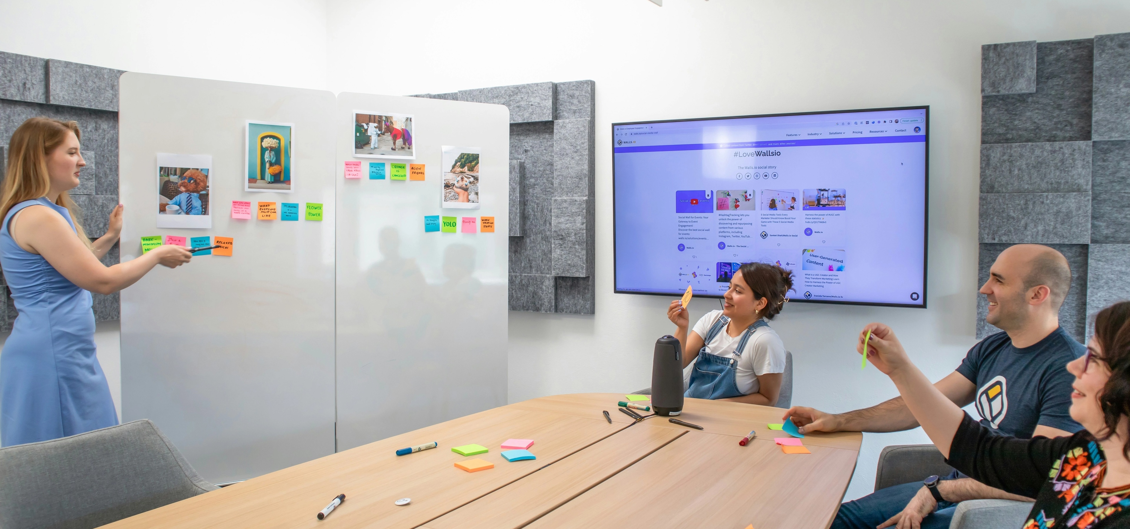 Product manager presenting product features to the team during a sales kickoff.