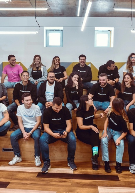 People sitting down together and talking
