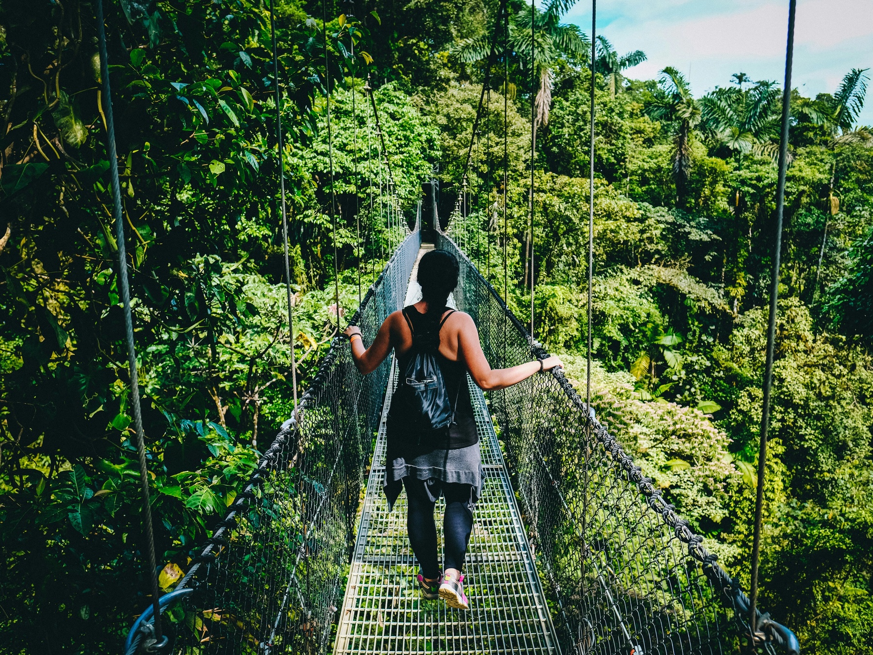 Woman walking in the jungles of Costa Rica