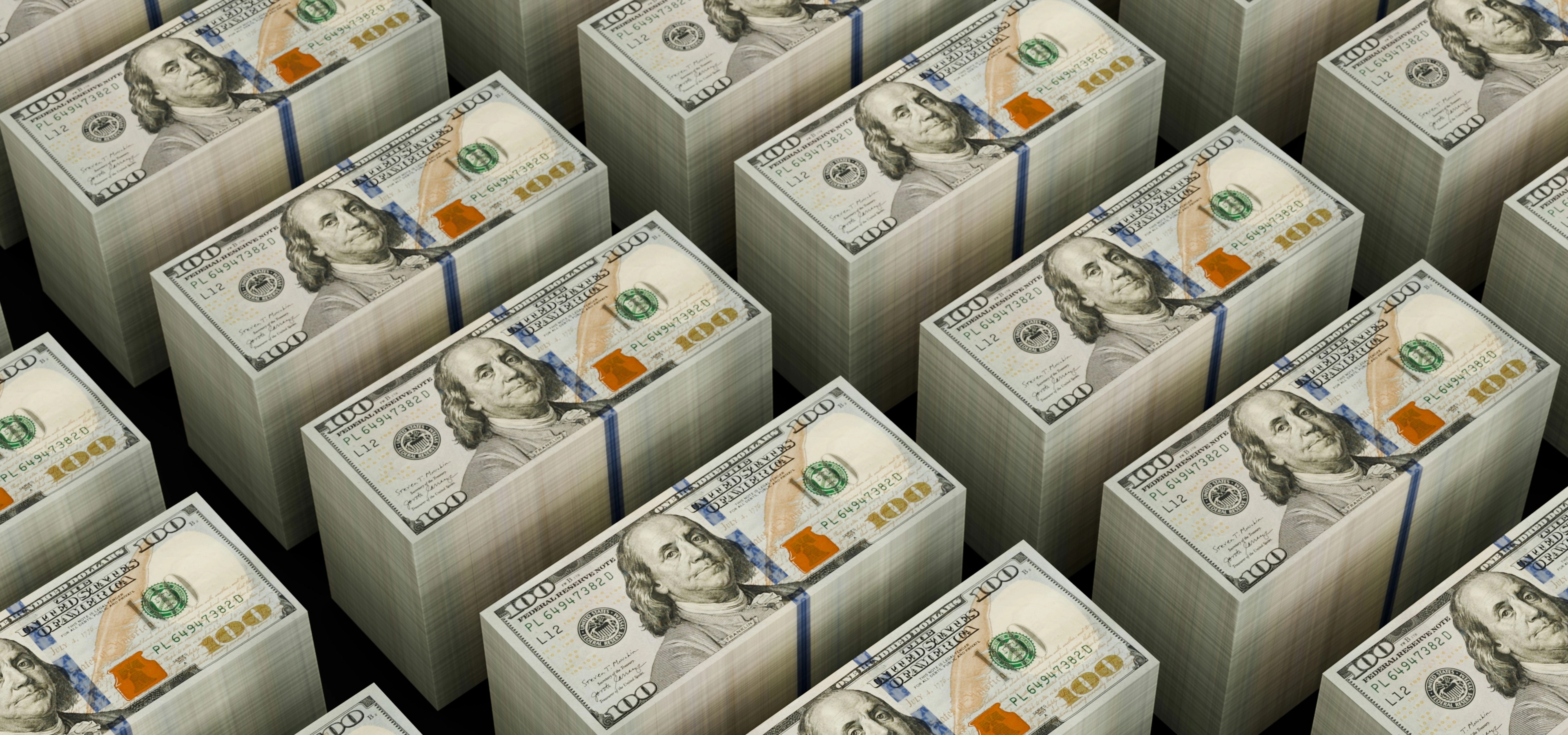 Stacks of USD 100 dollar bills