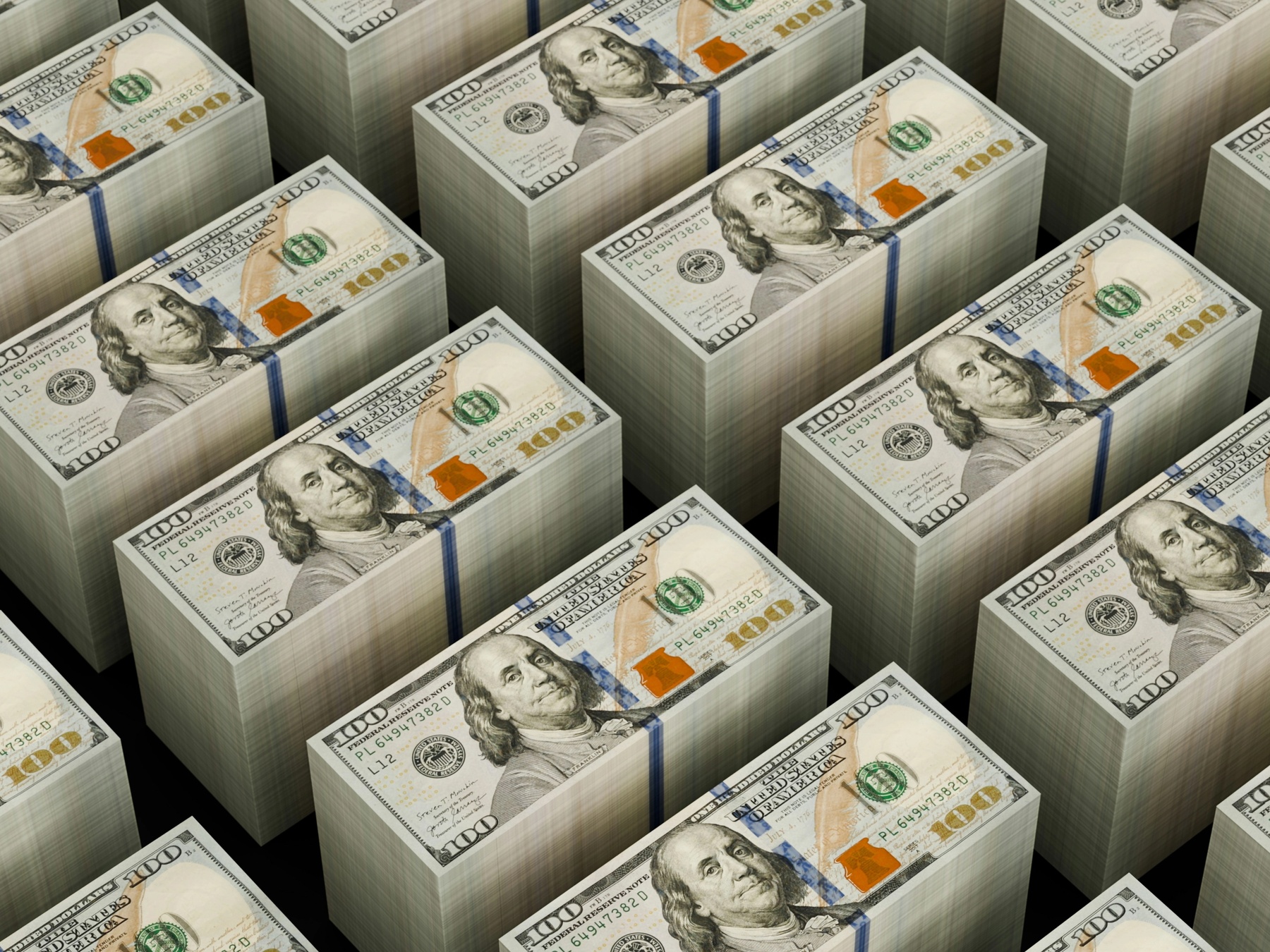 Stacks of USD 100 dollar bills