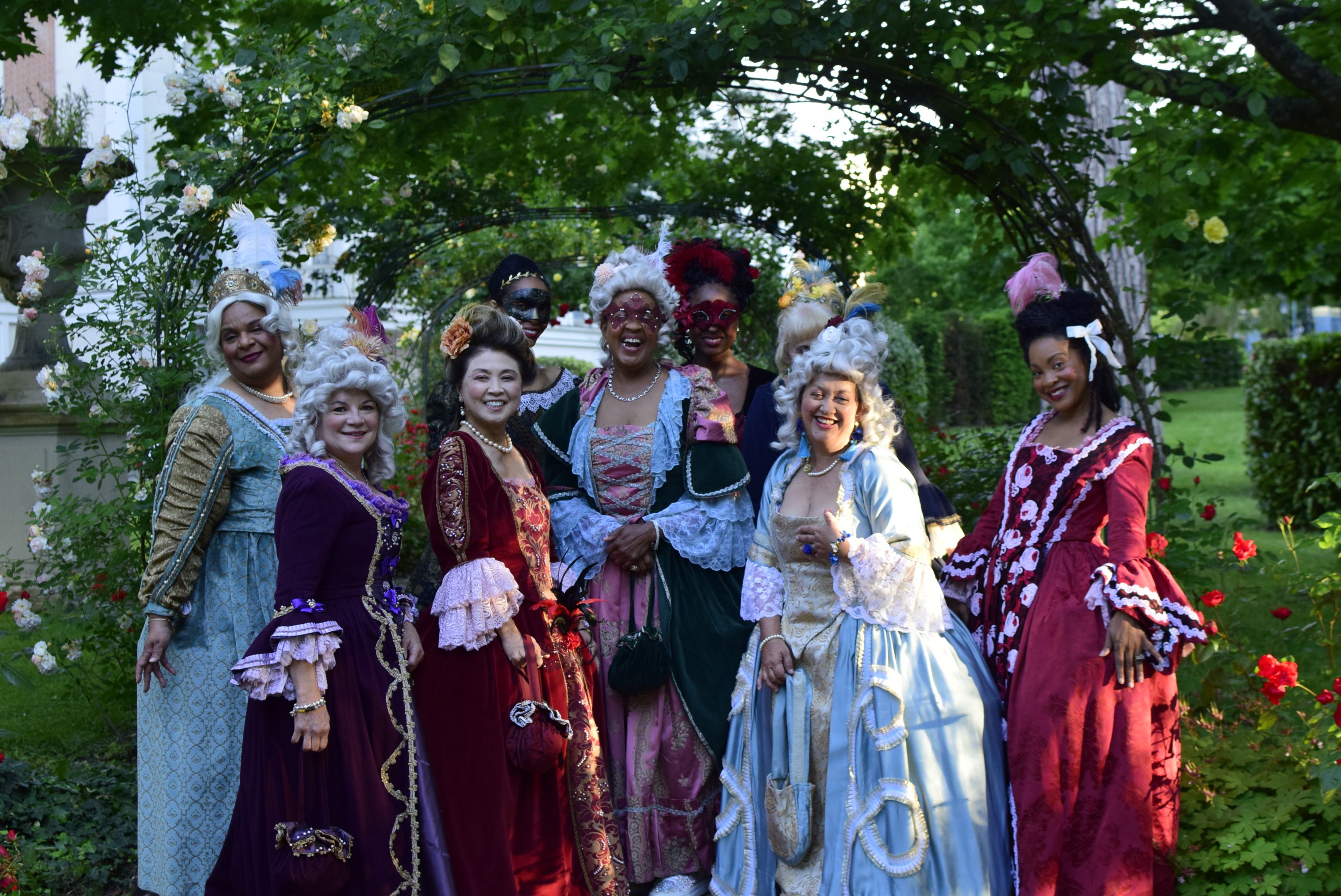 Women's association attending a costume ball at Versailles Palace