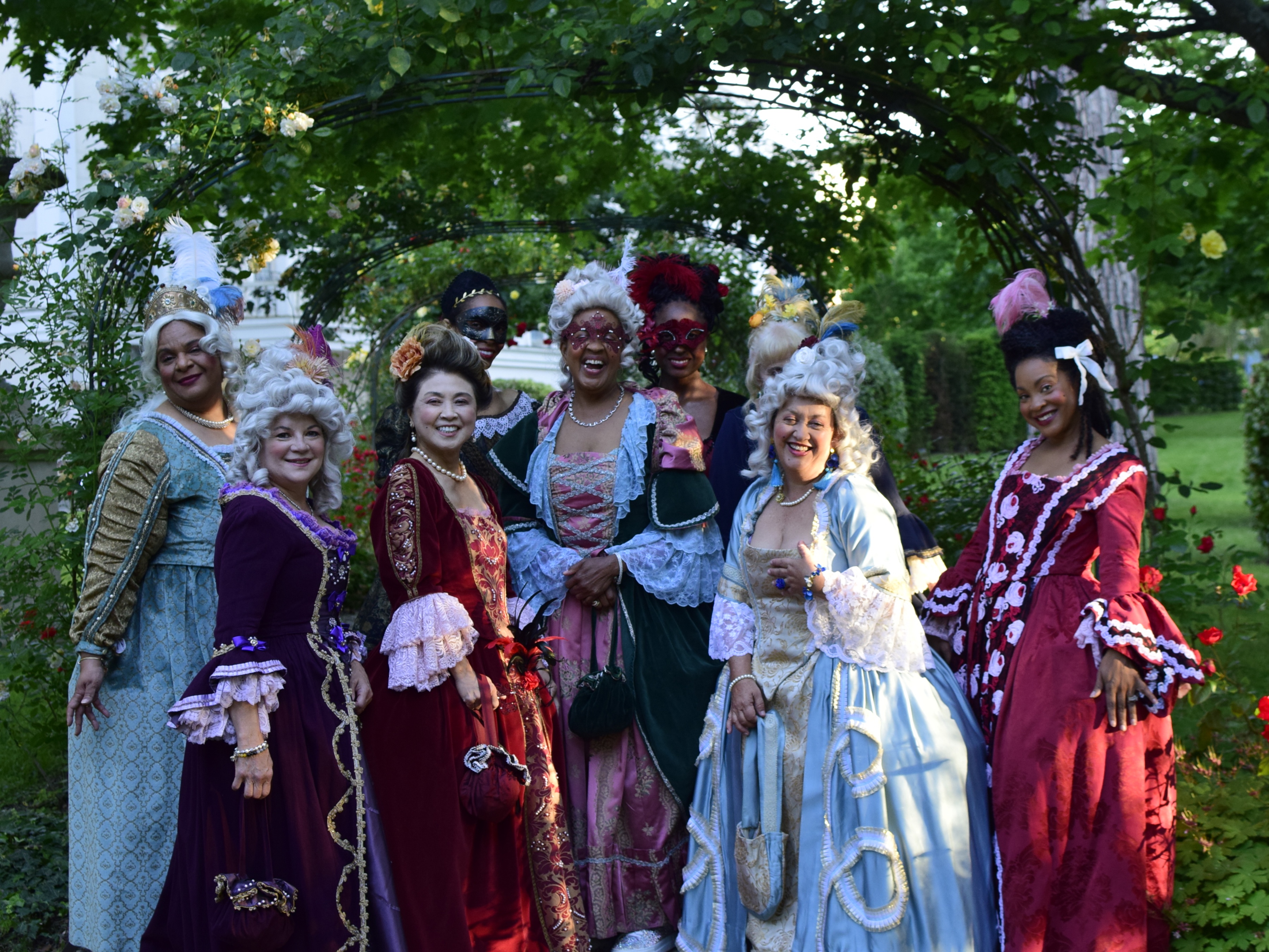 Women's association attending a costume ball at Versailles Palace
