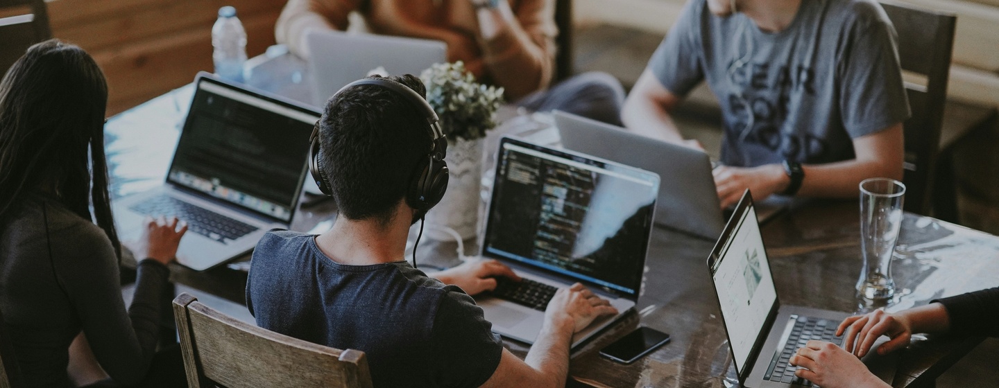 Colleagues working together in an AirBNB