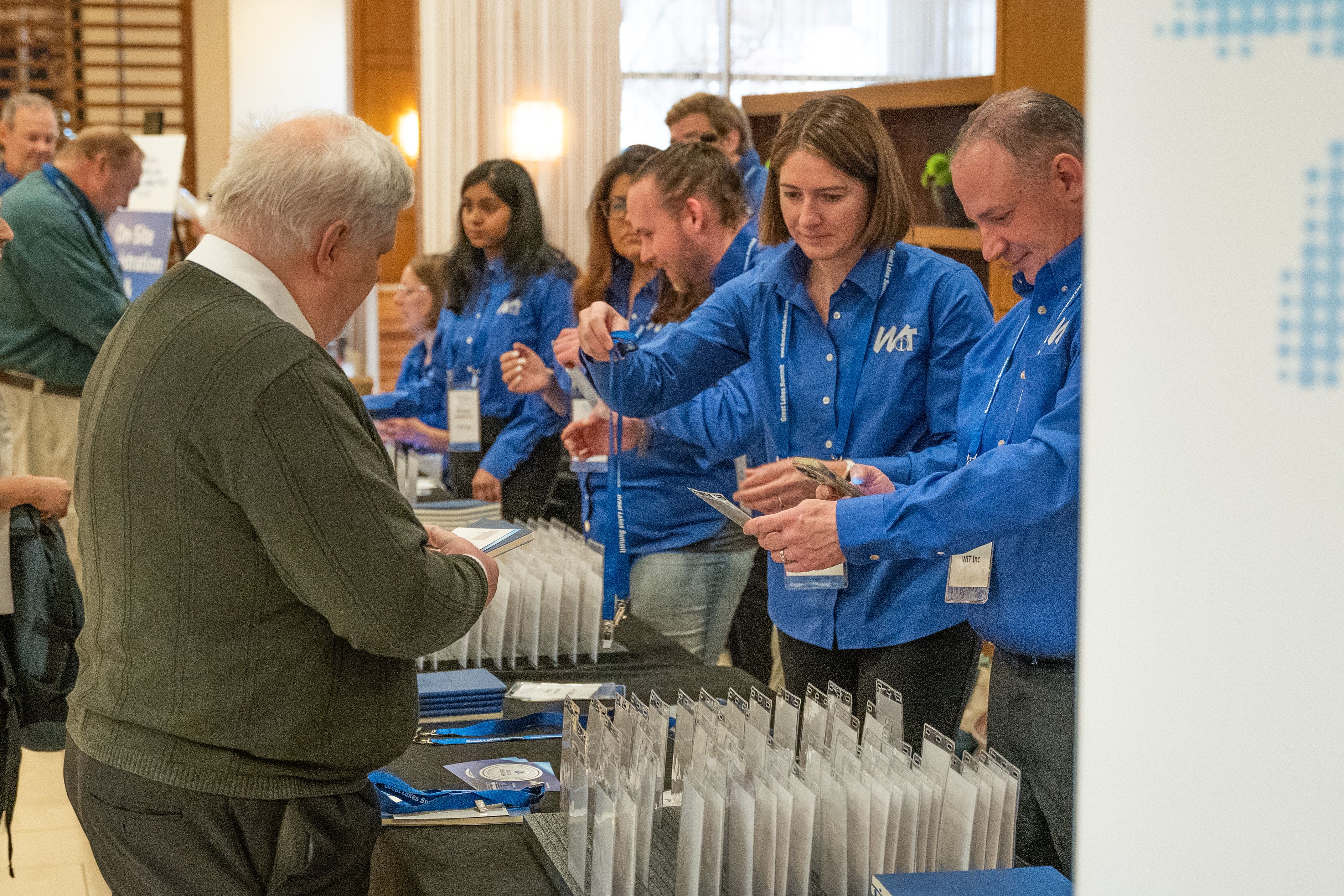 Team manages registration check-in for conference