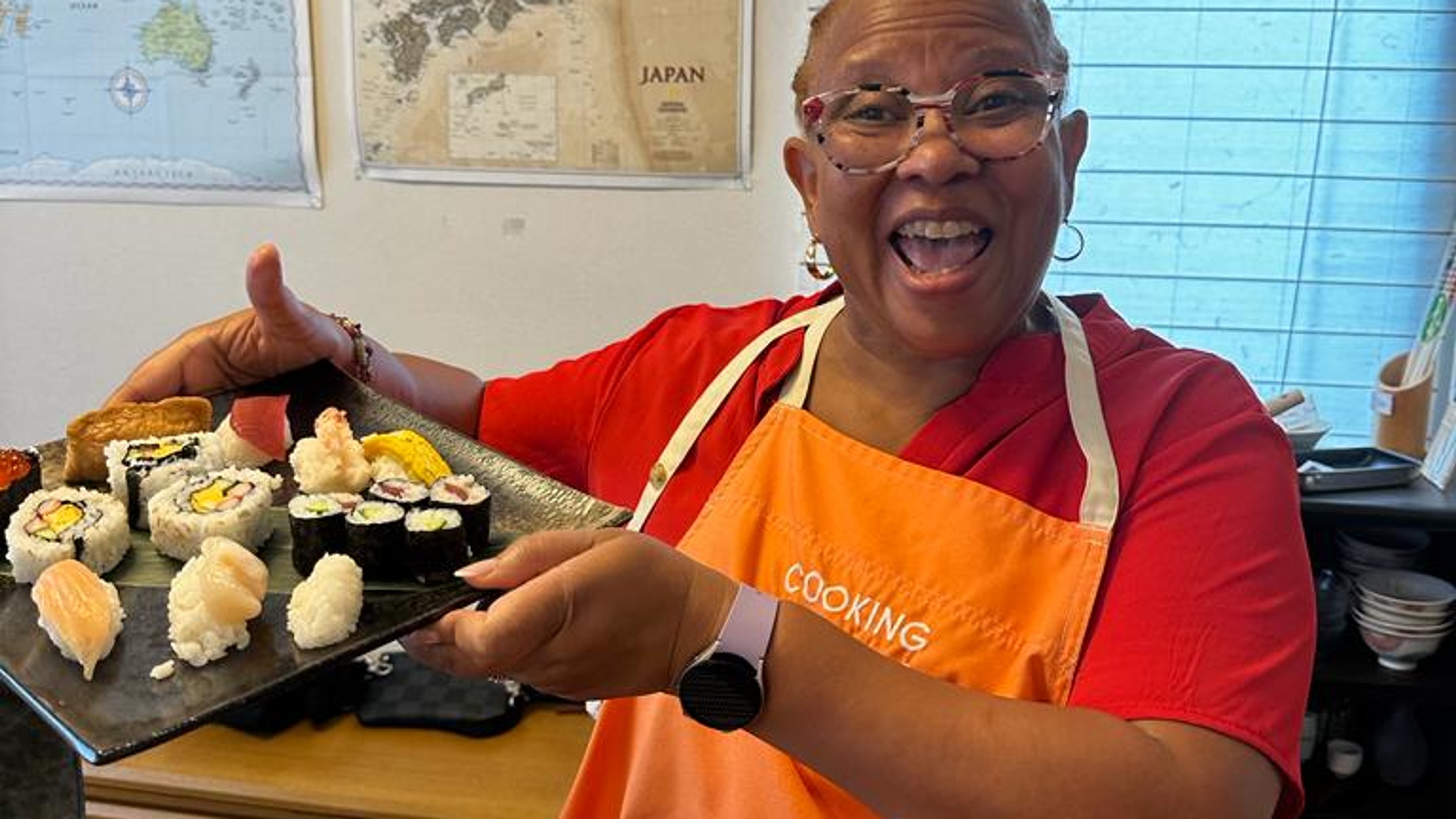 Traveler smiling during Sushi-making class