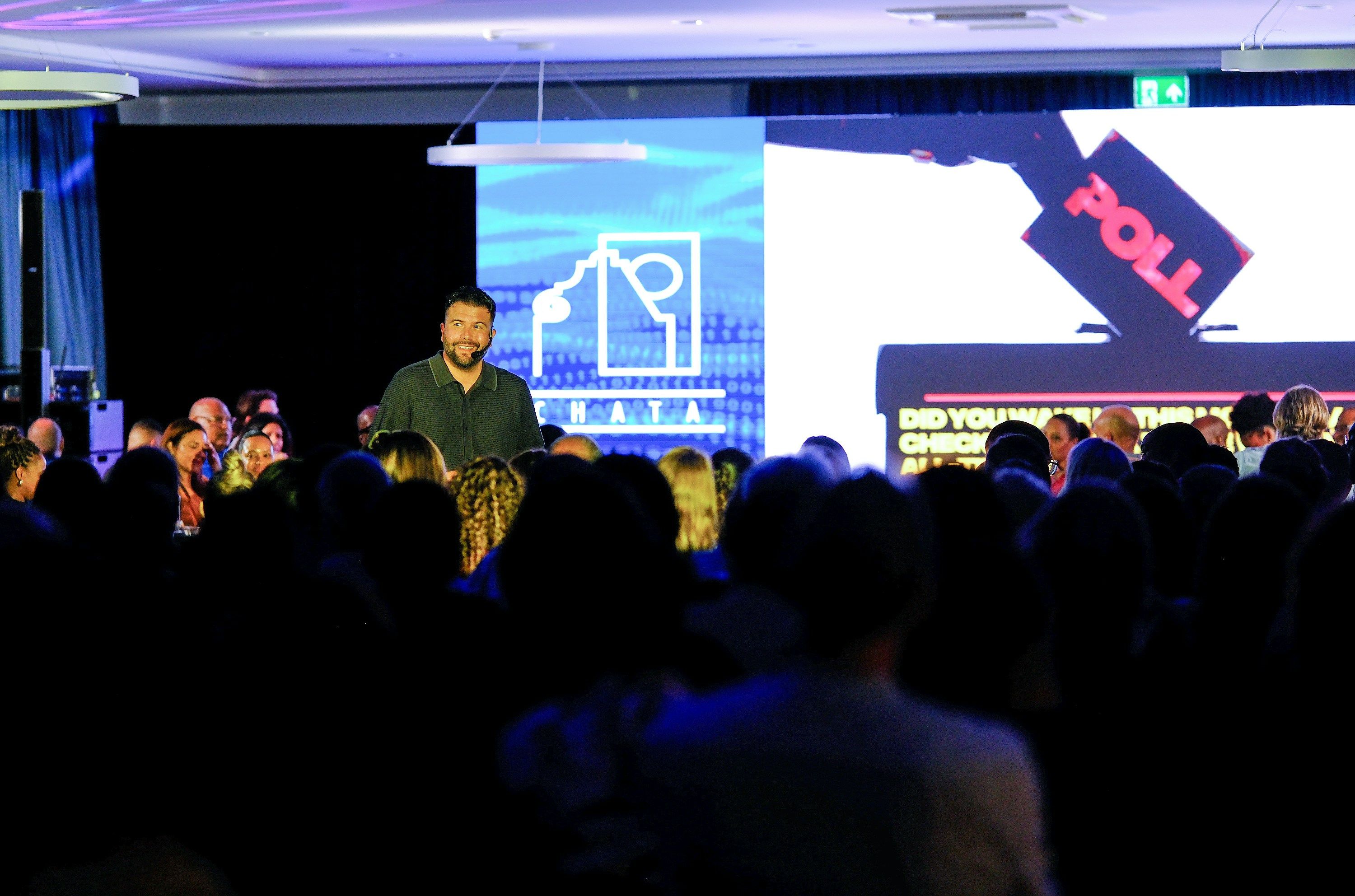 Marketing keynote speaker delivering a high-impact presentation at Sales Kickoff Event.