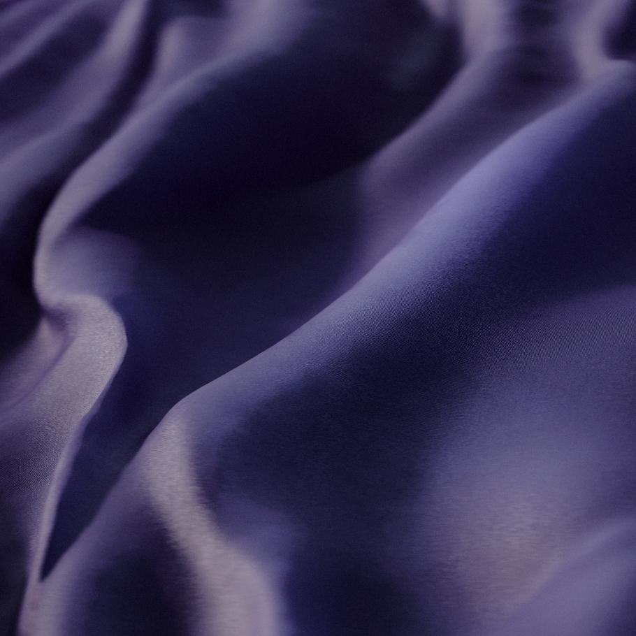 it is a close up of a purple waterproof shell jacket
