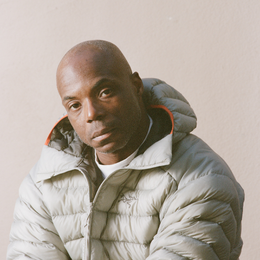 Russell Winfield wearing a jacket with the word arcteryx on it