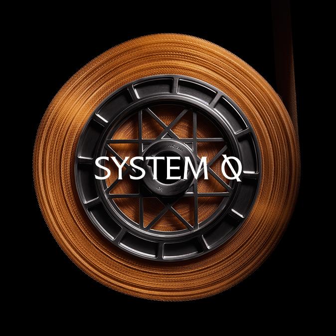 Copper-colored spool with dark gray spoked hub and white text 'SYSTEM 0' on a black background.