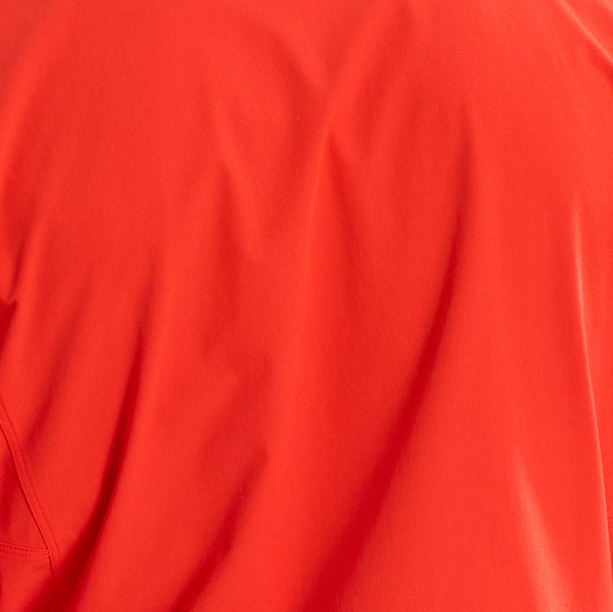 a close up of the back of a red shirt .