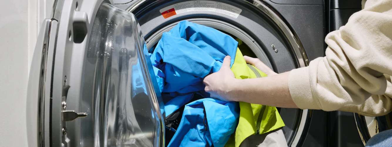 loading Arc'teryx jackets into washing machine