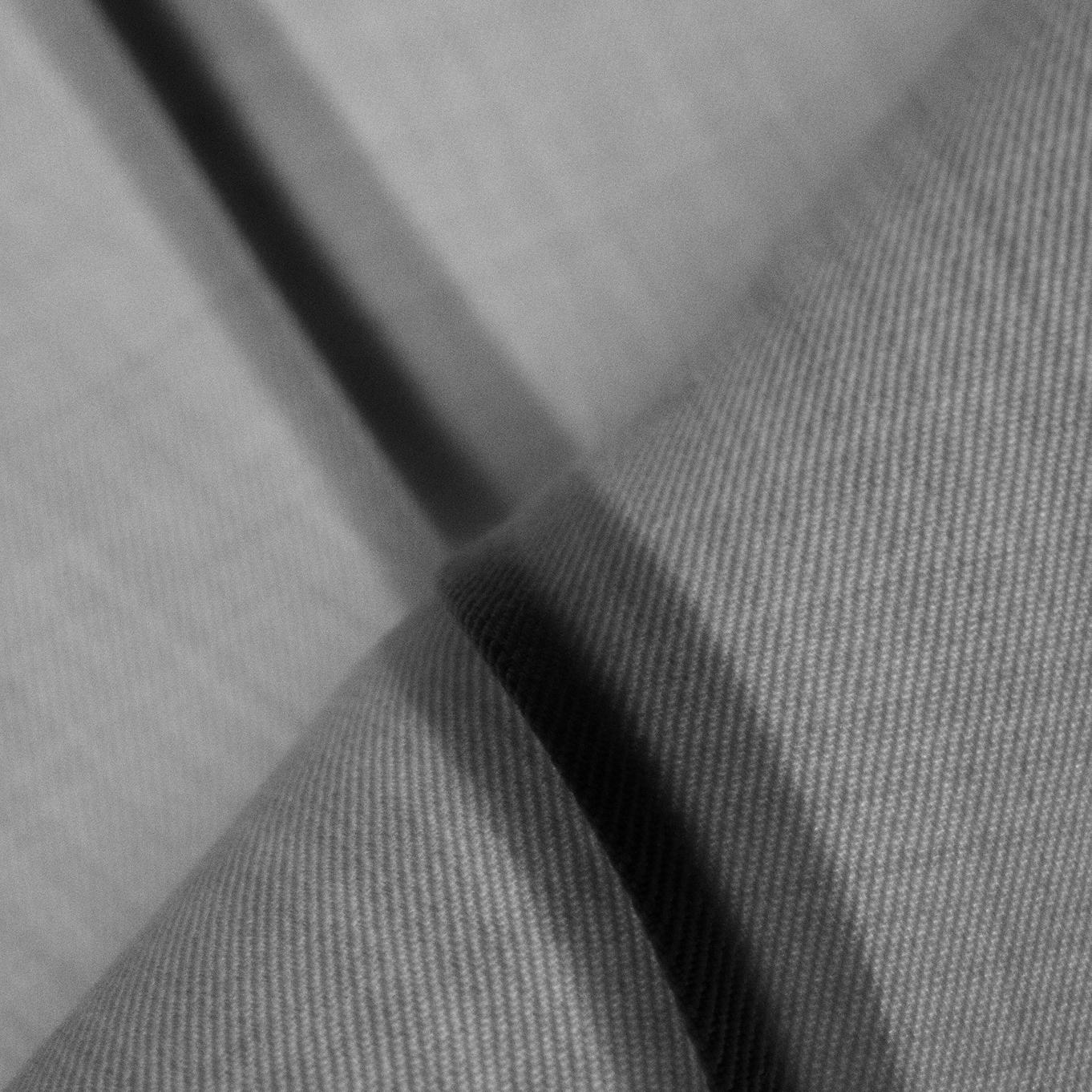 a close up of a piece of grey fabric.