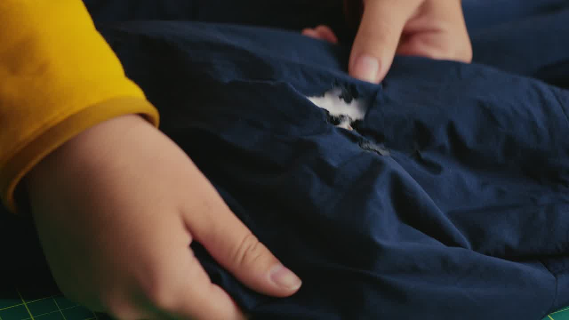 Patch a small tear in insulated gear