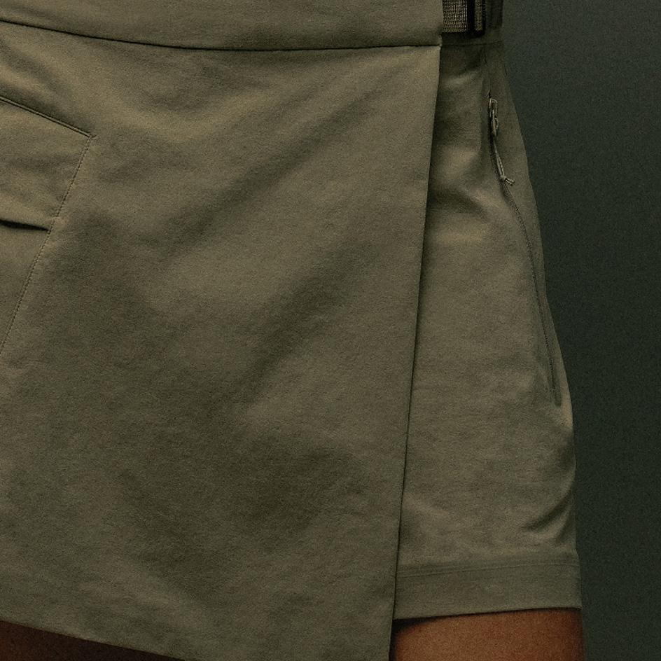 Olive green wrap shorts with a side zipper.