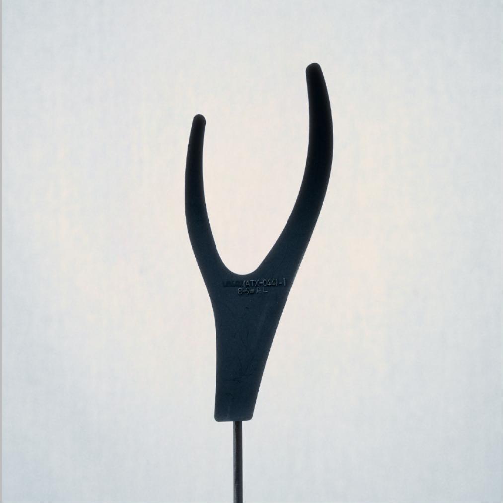 Dark gray, Y-shaped fishing rod holder with upward-curving arms on a light background.