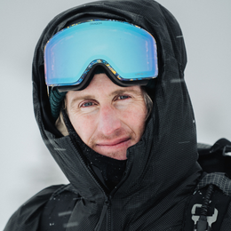 Chris Benchetler wearing a black jacket with the word arcteryx on it