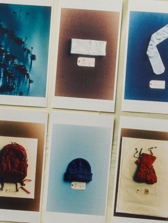 A grid of six photographs showing various items like a hat, gloves, and backpack with labels, plus an abstract blue image.