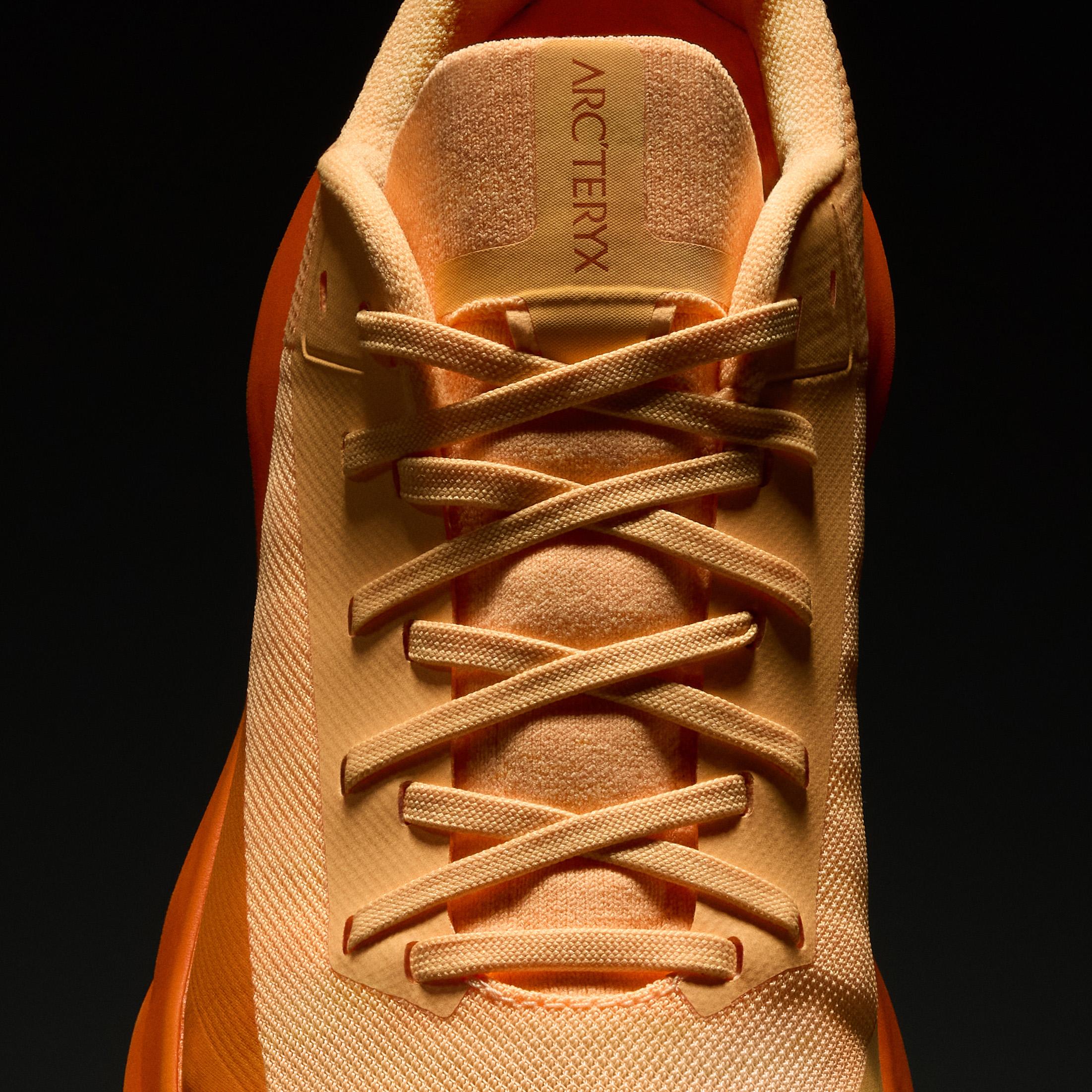 a close up of the laces on a pair of shoes .