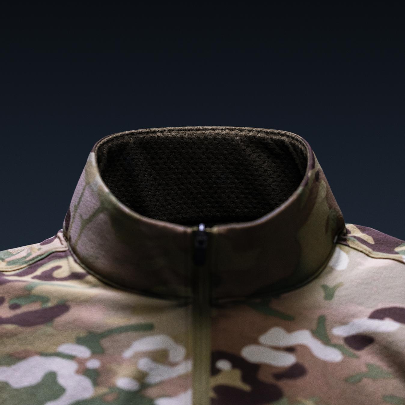 Camouflage tactical shirt with a partial zipper and mesh-lined collar.