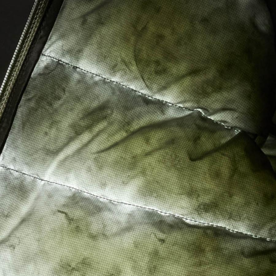 a close up of the inside of a jacket with a zipper .